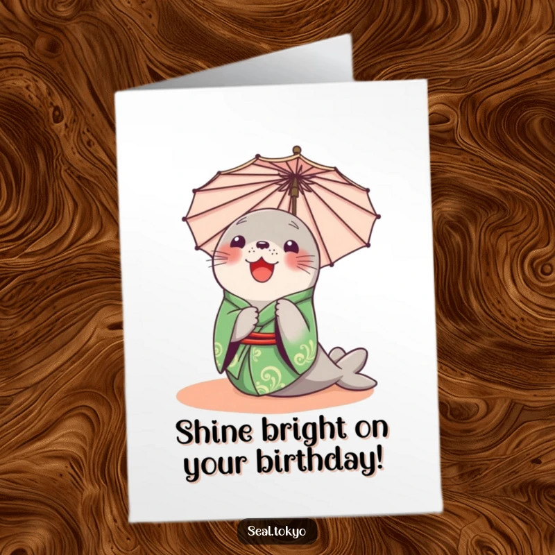 Funny Free Printable Birthday Card: Delighted seal in a green kimono curiously peeking from behind a parasol, ready to surprise.