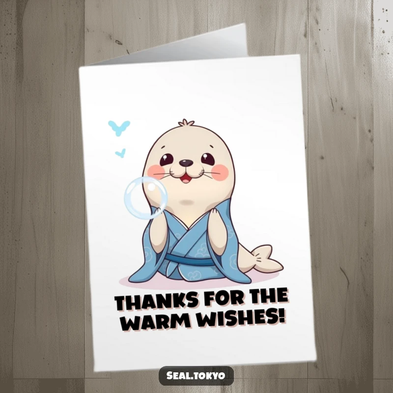 Funny Free Printable Thank You Card: A smiling seal in a blue kimono blowing a bubble, offering thanks playfully.