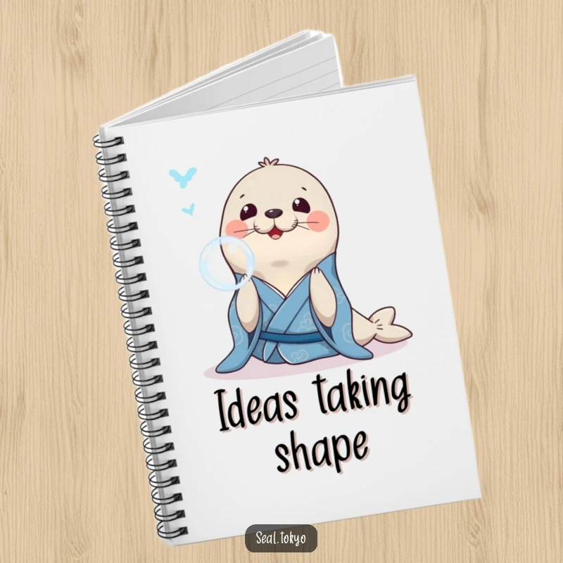 Funny Seal Notebook: A smiling seal in a blue kimono, gracefully blowing a bubble ring, ideal for calm writing.