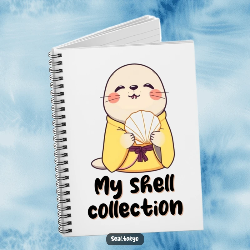 Funny curious seal in a yellow kimono holds a seashell on the cover of a notebook, ideal for capturing creative thoughts.
